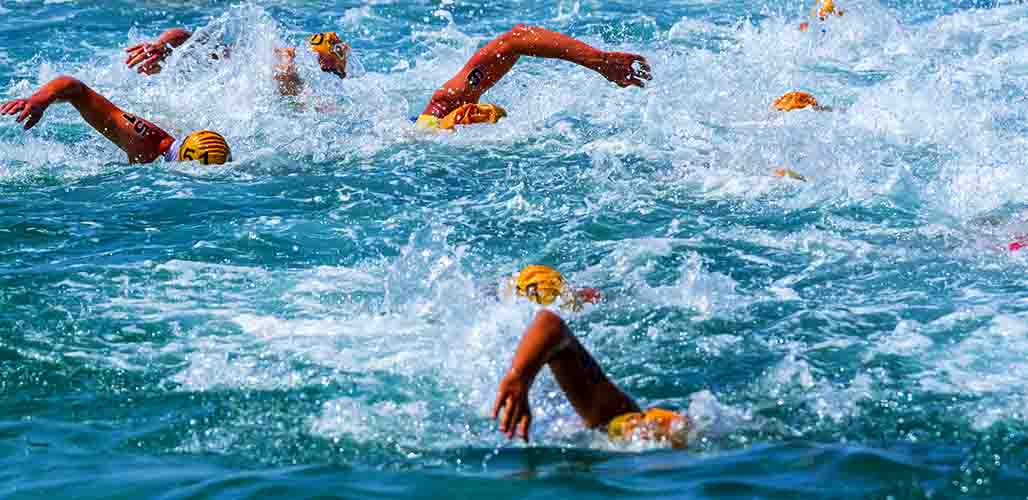 can you stop swimming during a triathlon