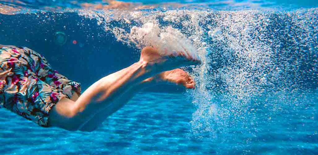 how to teach breaststroke kick